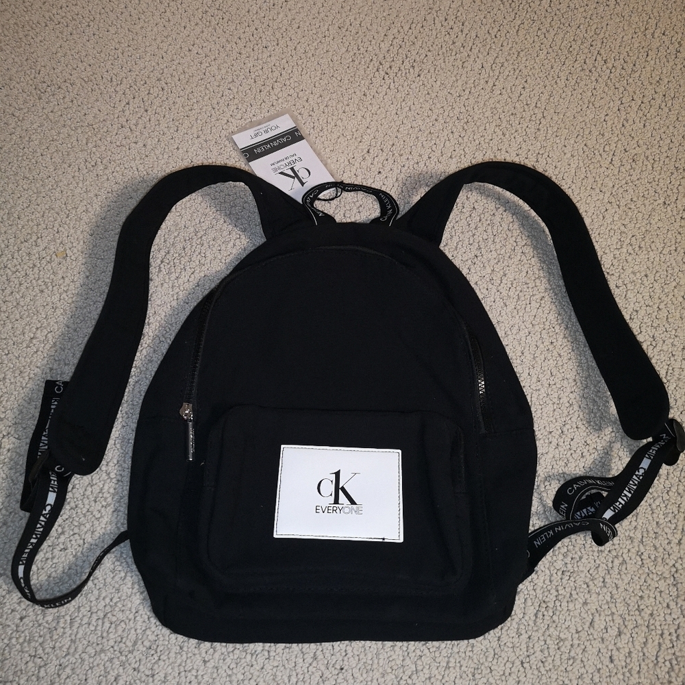 CALVIN KLEIN OS backpack, hidden red interior